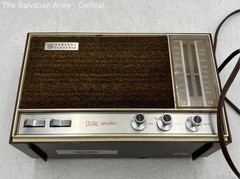 General Electric Brown Silver Solid State Corded Dual Speaker AM/FM Radio